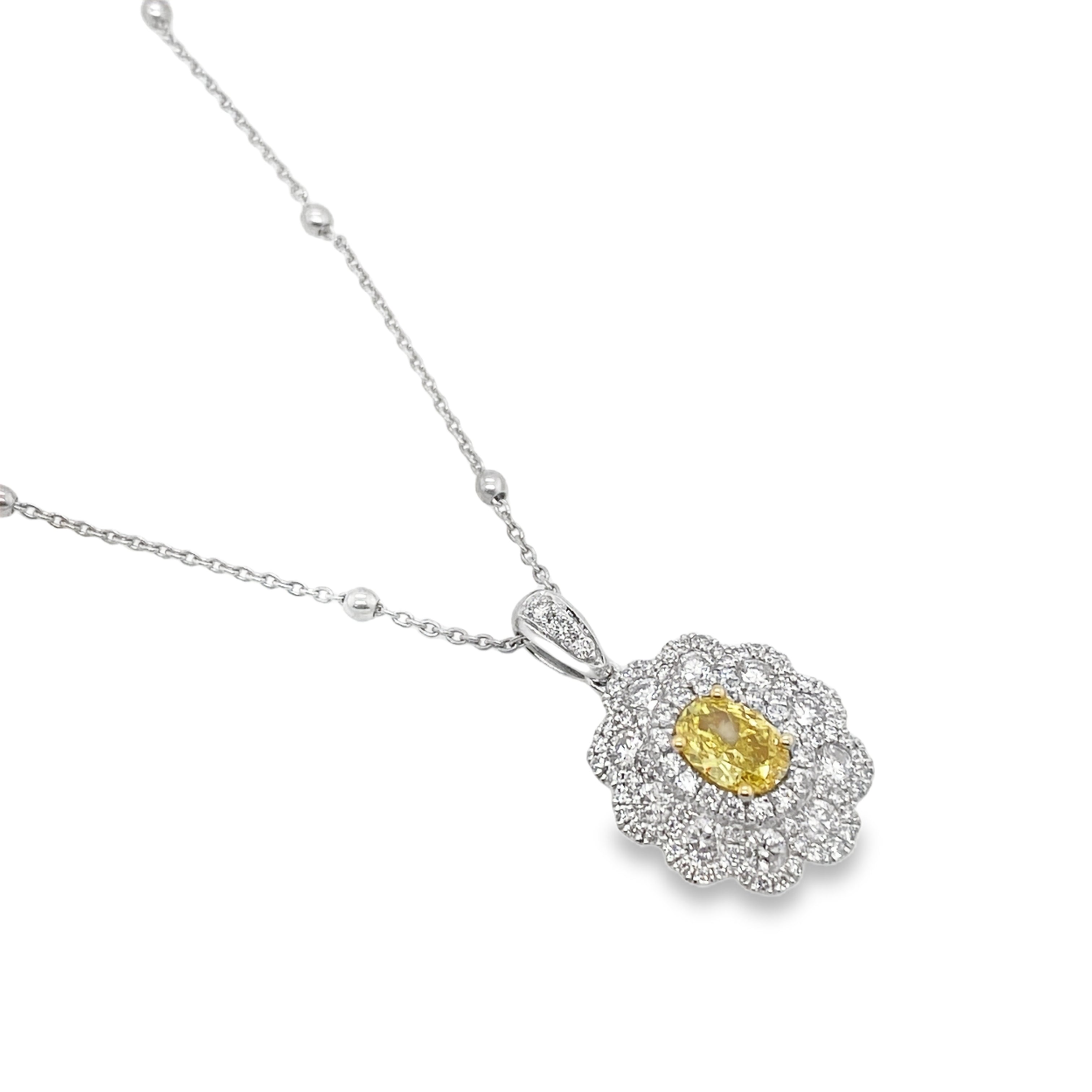 Fancy Vivid Yellow Oval Diamond Pendant