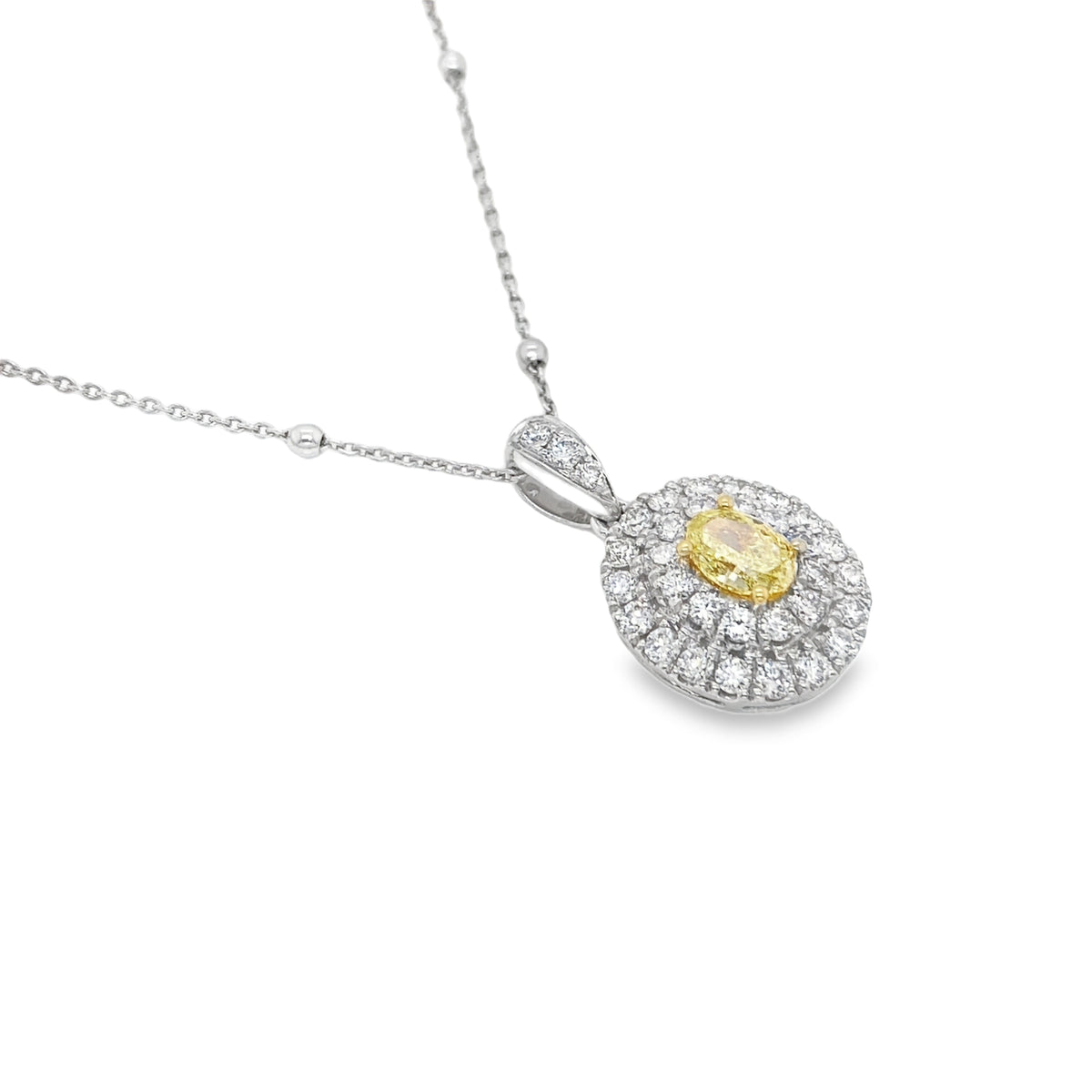 Fancy Intense Yellow Oval Diamond Pendant